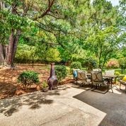 307 Raintree Drive Hendersonville, TN 37075 - Photo 27 of 42 a backyard of a house with parked cars