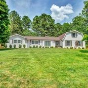 307 Raintree Drive Hendersonville, TN 37075 - Photo 32 of 42 a front view of a house with a yard