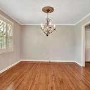 307 Raintree Drive Hendersonville, TN 37075 - Photo 5 of 42 a view of a room with wooden floor and chandelier