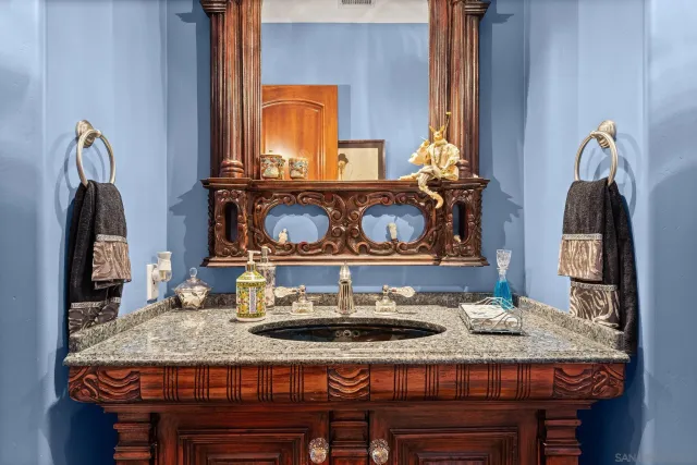 a kitchen with a table and chairs in it