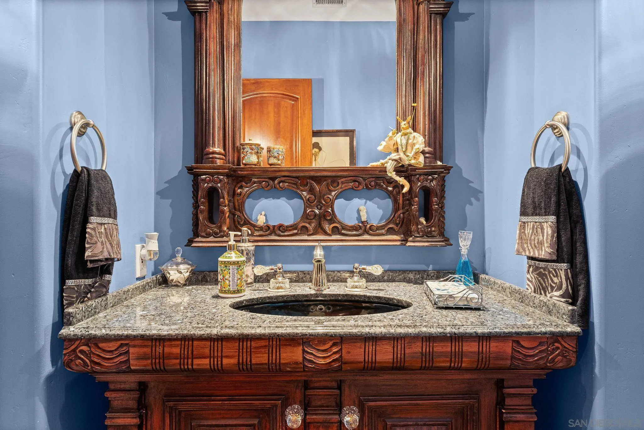 14786 Rancho Santa Fe Farms Road Rancho Santa Fe, CA 92067 - Photo 17 of 49 a kitchen with a table and chairs in it