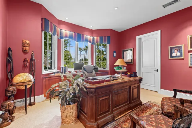 a bed room with furniture and windows