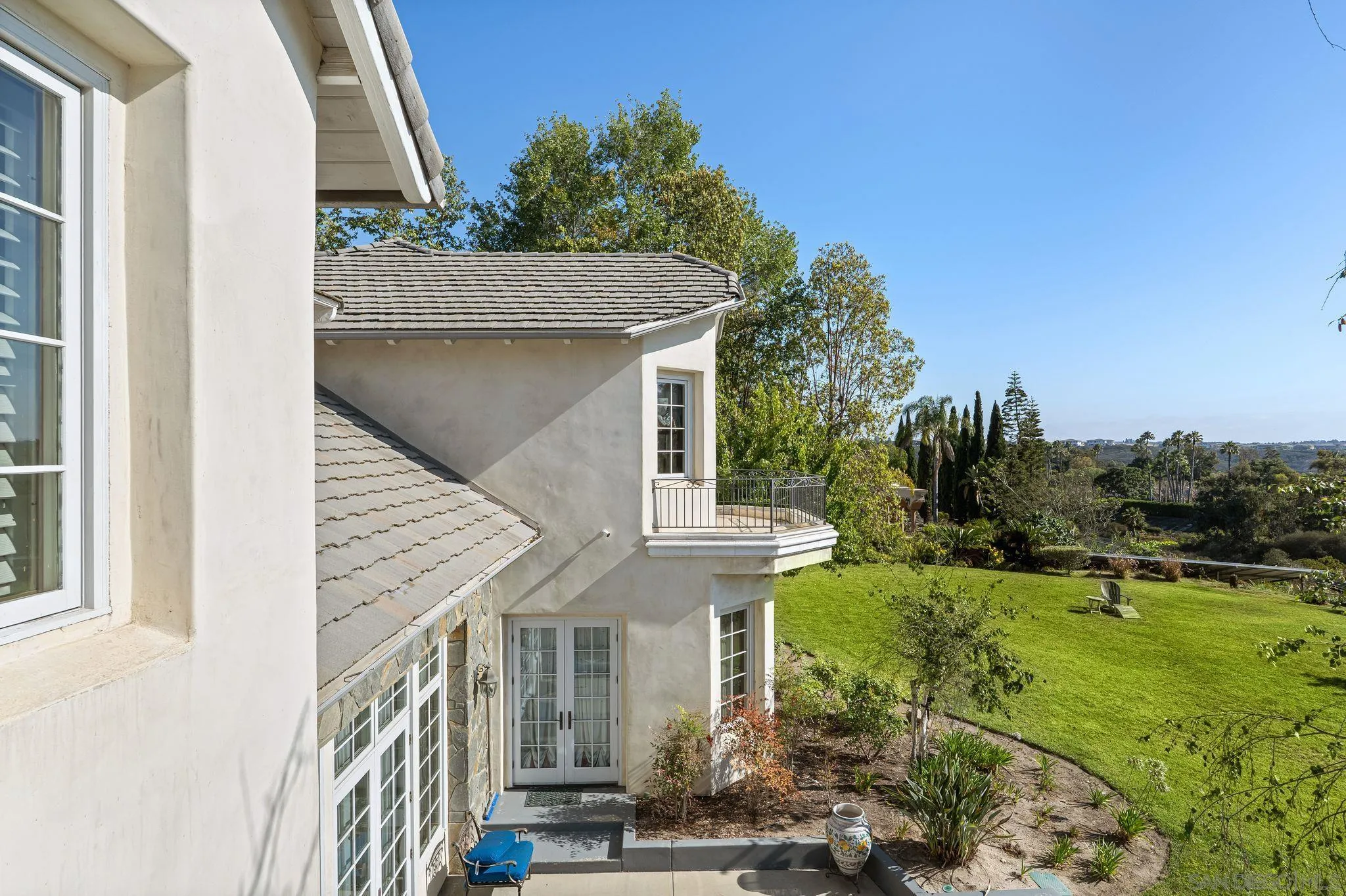 14786 Rancho Santa Fe Farms Road Rancho Santa Fe, CA 92067 - Photo 26 of 49 a view of a house with a yard