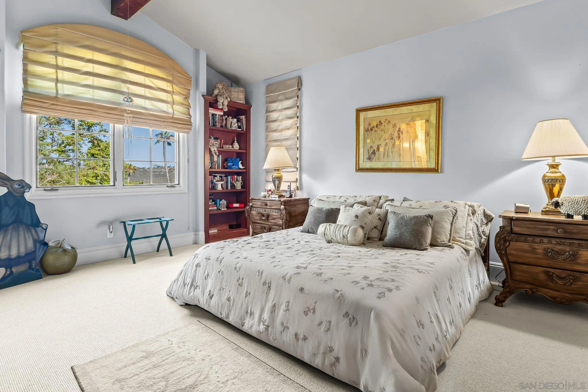 14786 Rancho Santa Fe Farms Road Rancho Santa Fe, CA 92067 - Photo 27 of 49 a bedroom with a bed and a dresser next to a window