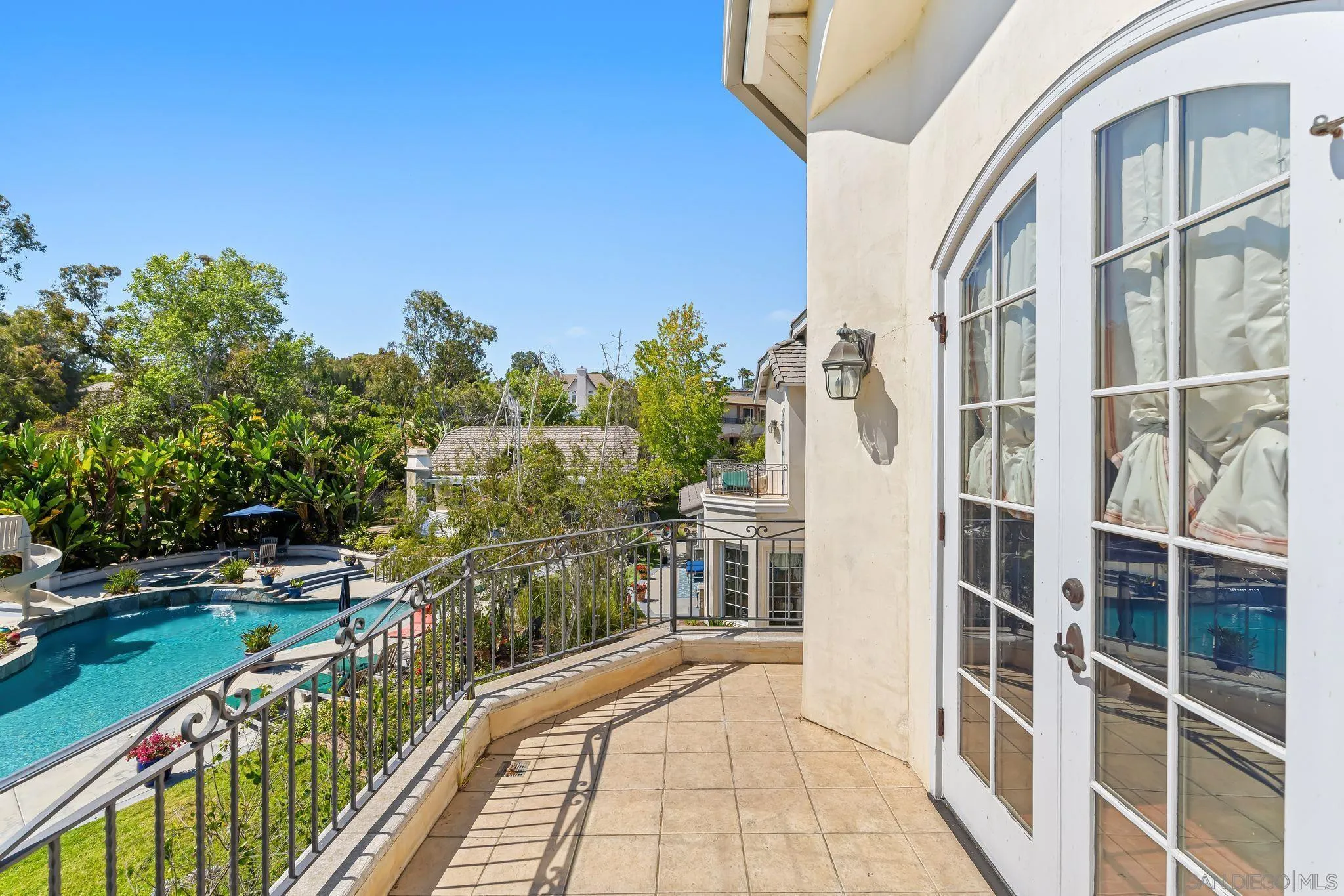 14786 Rancho Santa Fe Farms Road Rancho Santa Fe, CA 92067 - Photo 29 of 49 a view of a balcony with outdoor space