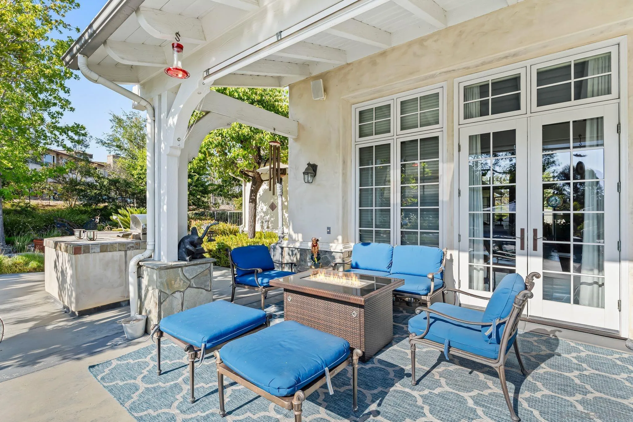 14786 Rancho Santa Fe Farms Road Rancho Santa Fe, CA 92067 - Photo 31 of 49 a building outdoor space with patio furniture