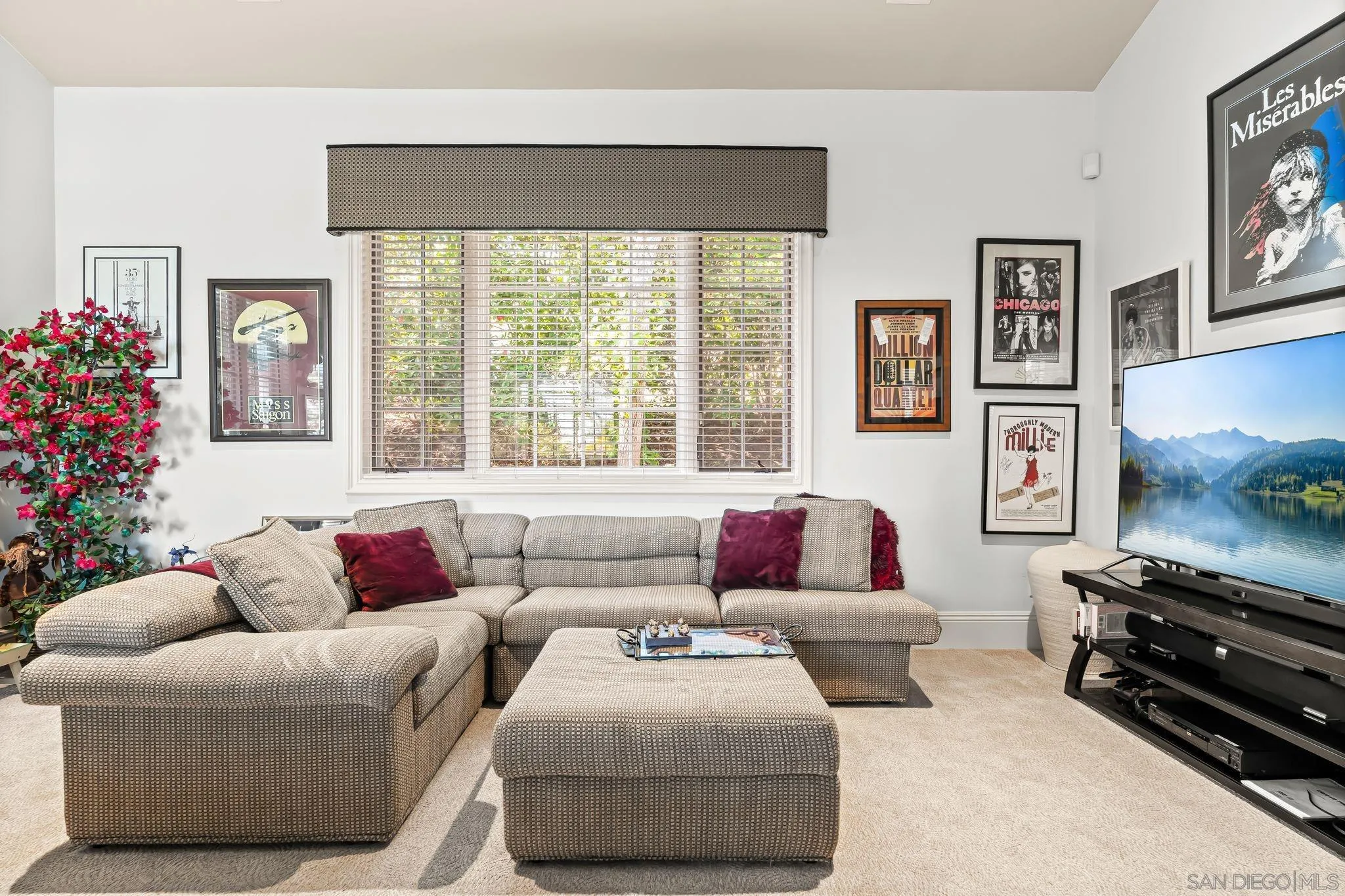 14786 Rancho Santa Fe Farms Road Rancho Santa Fe, CA 92067 - Photo 34 of 49 a living room with furniture and a flat screen tv