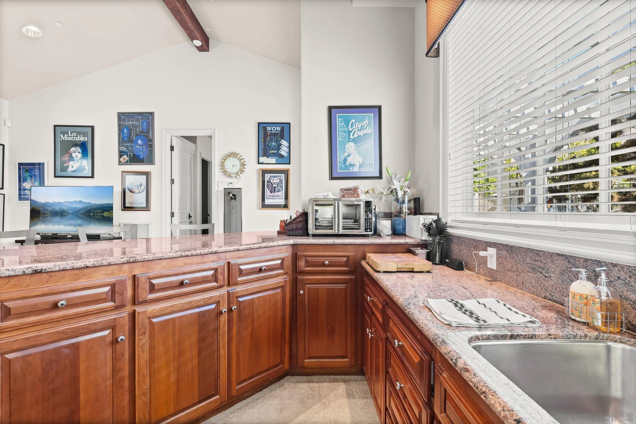 14786 Rancho Santa Fe Farms Road Rancho Santa Fe, CA 92067 - Photo 37 of 49 a kitchen with stainless steel appliances granite countertop a sink stove and cabinets
