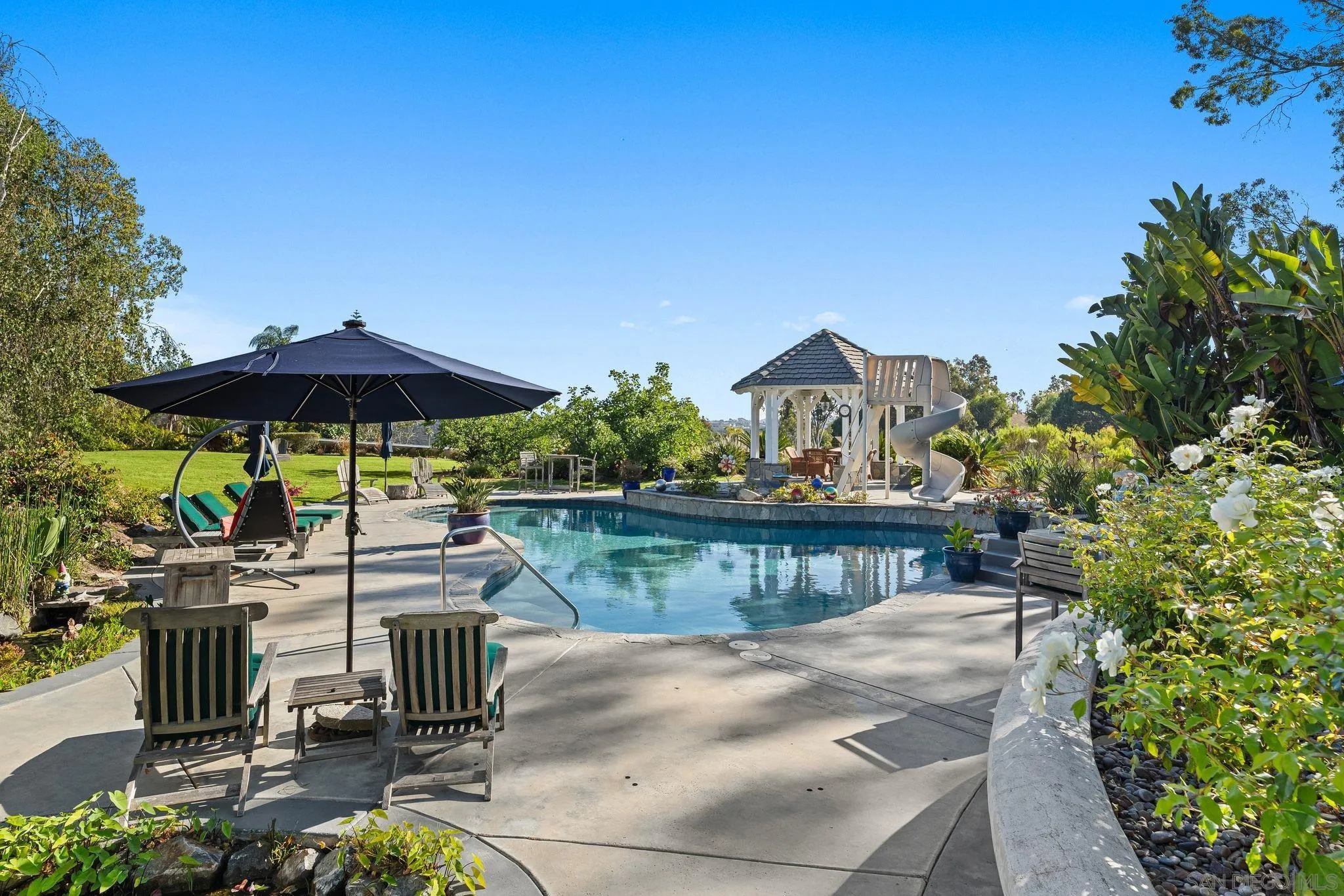14786 Rancho Santa Fe Farms Road Rancho Santa Fe, CA 92067 - Photo 42 of 49 a view of house with outdoor space and sitting area