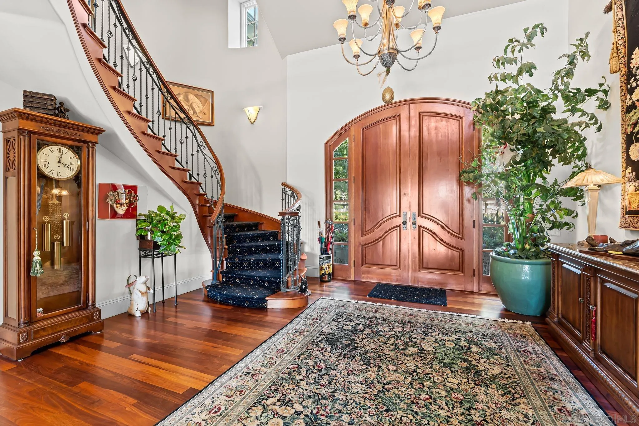 14786 Rancho Santa Fe Farms Road Rancho Santa Fe, CA 92067 - Photo 7 of 49 a view of an entryway with wooden floor