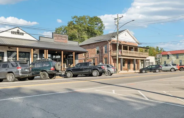 a view of a car park in front of a building