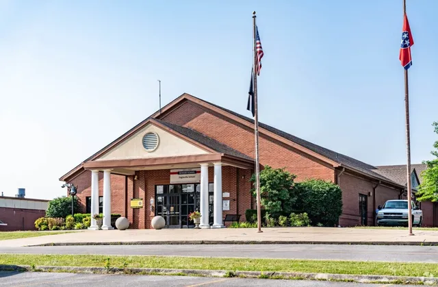a front view of a house with a porch