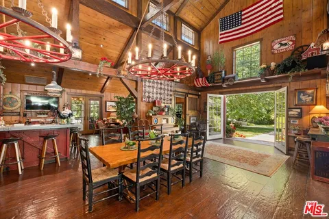 a view of a tables and chairs in a patio