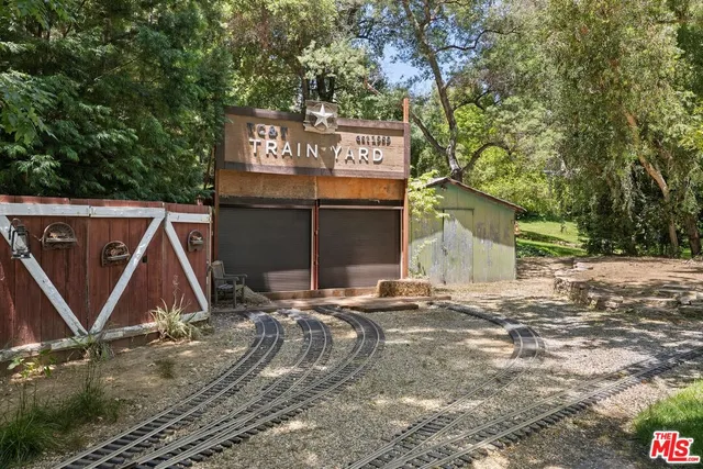 a view of a house with large windows
