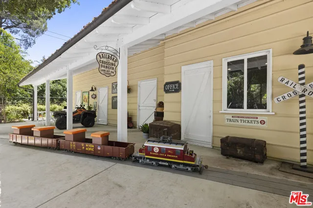 a outdoor living space with furniture and garden