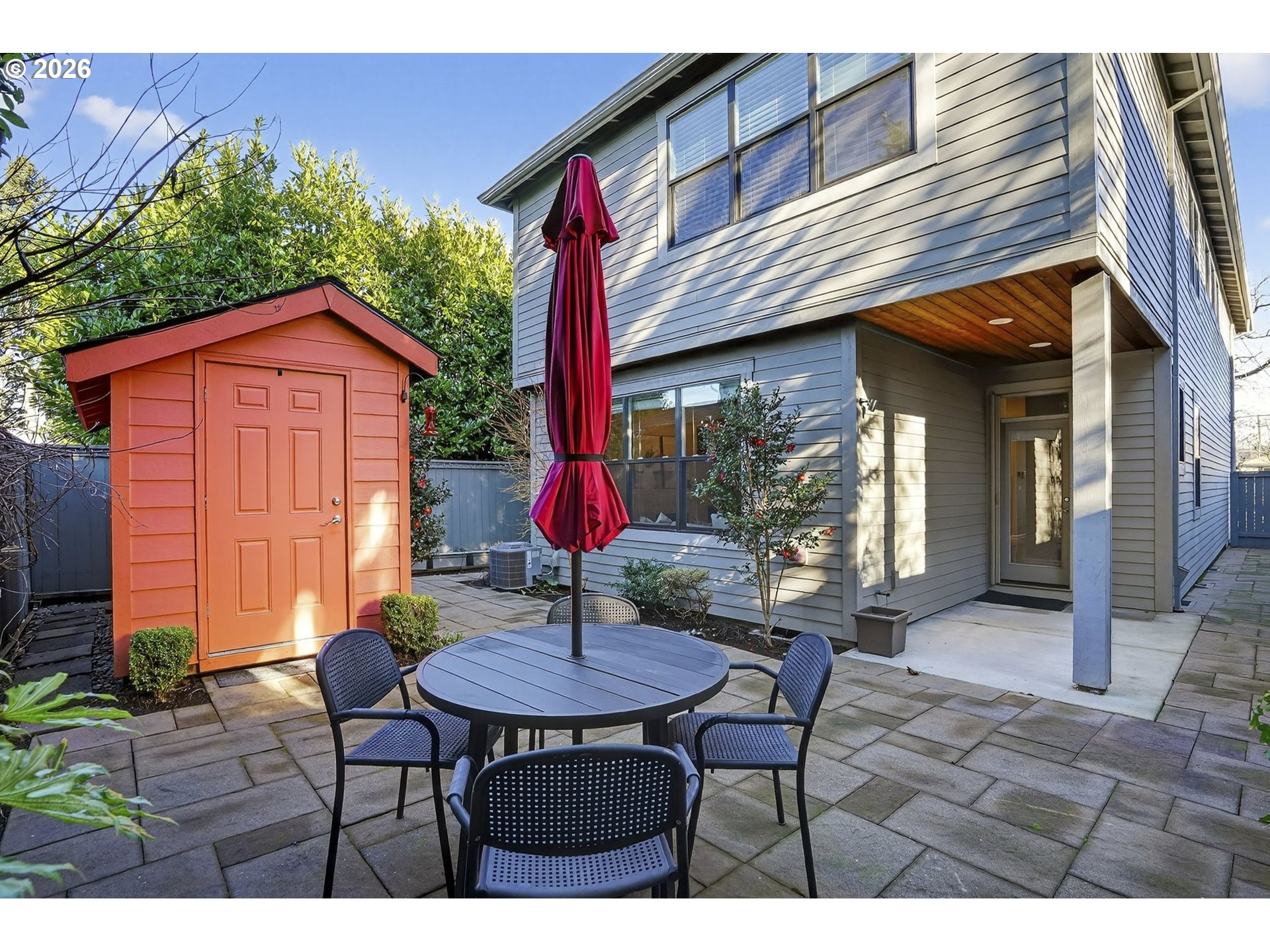 6123 Northeast 34th Avenue Portland, OR 97211 - Photo 40 of 42 a backyard of a house with table and chairs