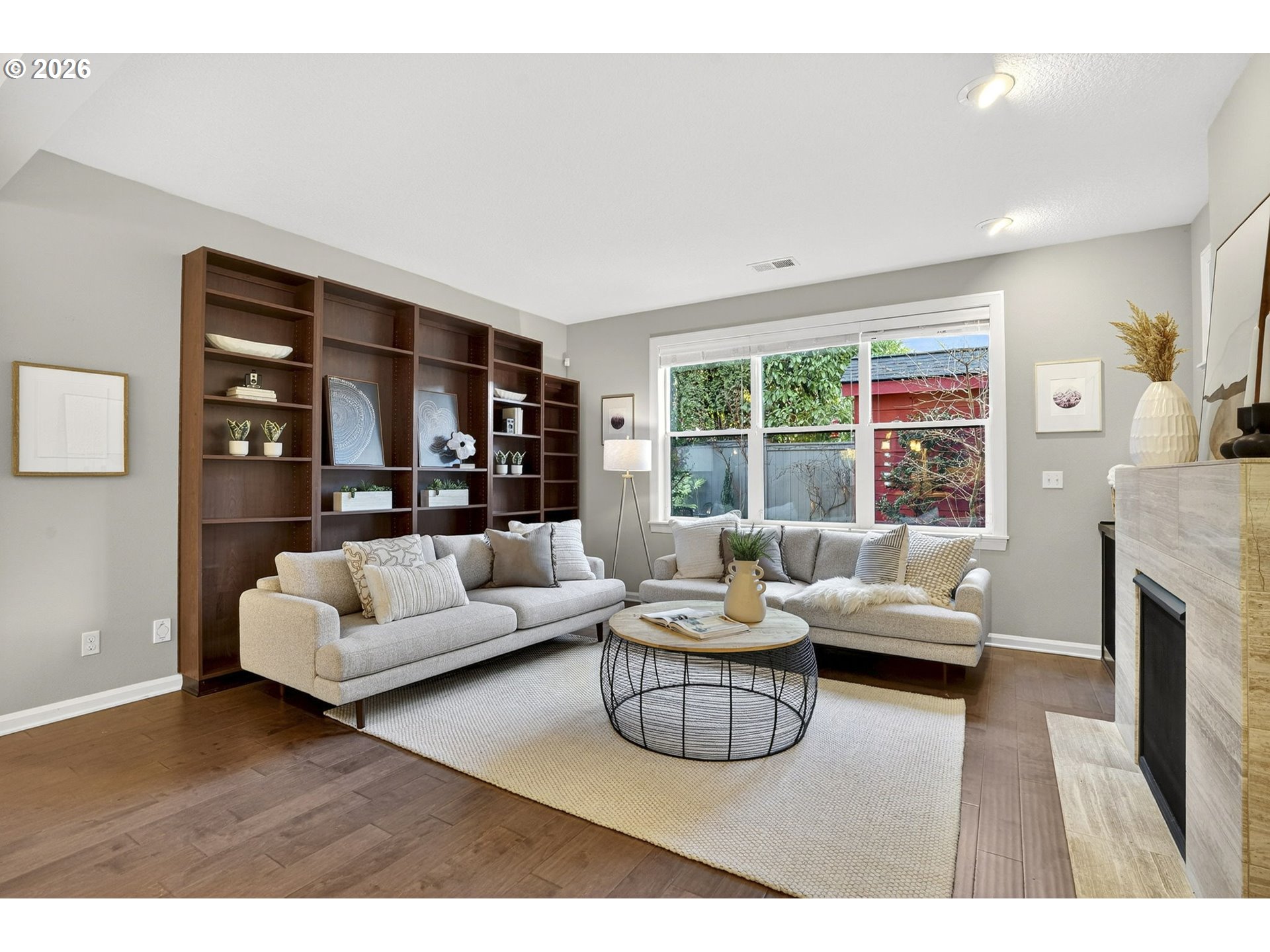 6123 Northeast 34th Avenue Portland, OR 97211 - Photo 7 of 42 a living room with furniture and a large window
