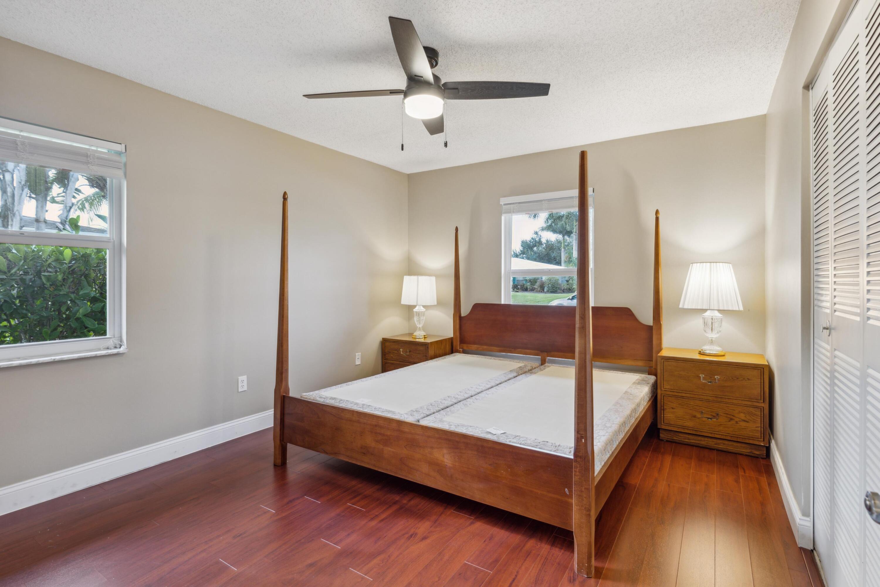 1536 Southeast Sunshine Avenue Port St. Lucie, FL 34952 - Photo 11 of 18 a bedroom with a bed and window