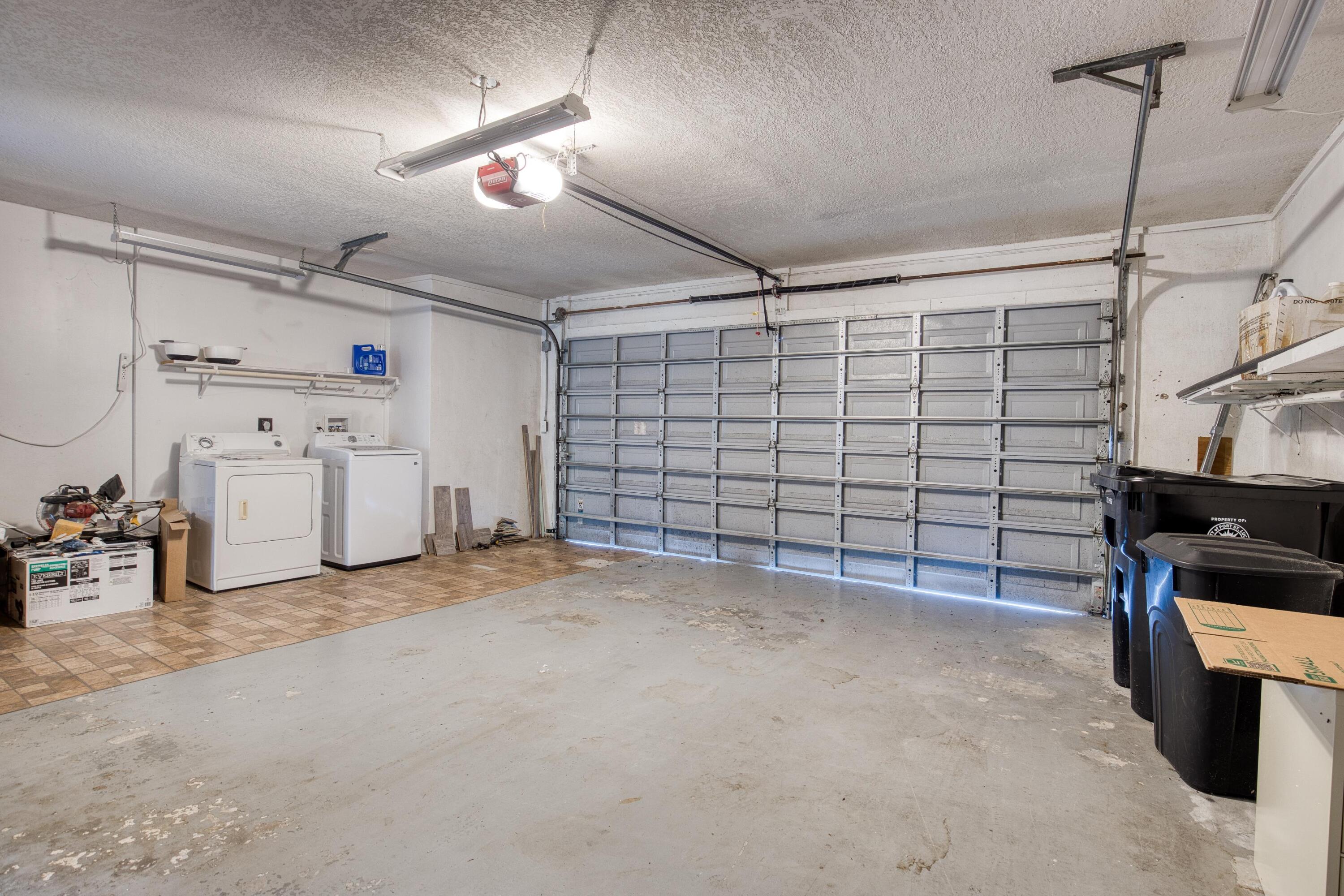 1536 Southeast Sunshine Avenue Port St. Lucie, FL 34952 - Photo 14 of 18 a view of a garage