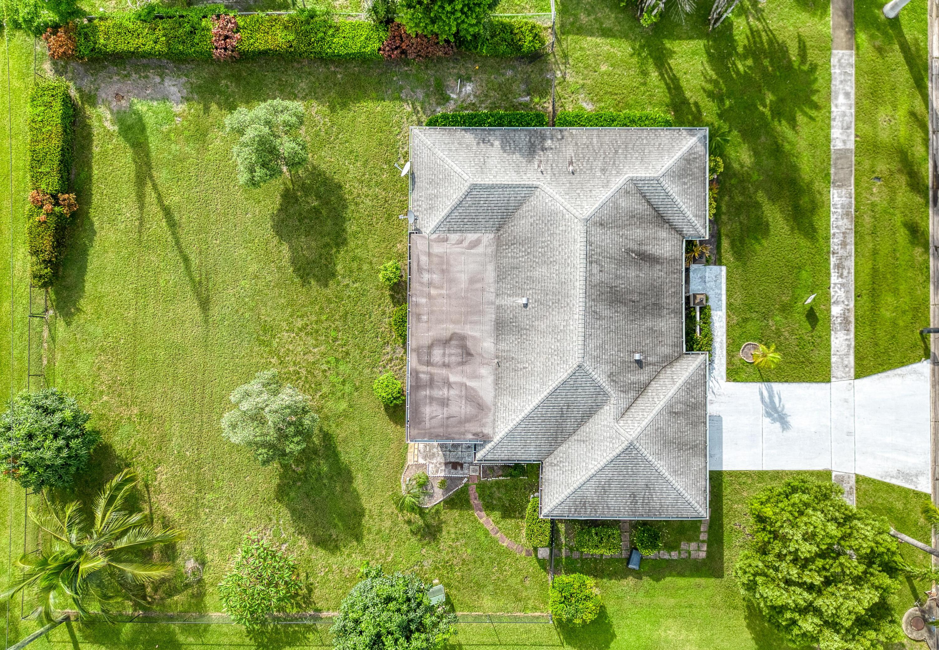 1536 Southeast Sunshine Avenue Port St. Lucie, FL 34952 - Photo 15 of 18 an aerial view of a house