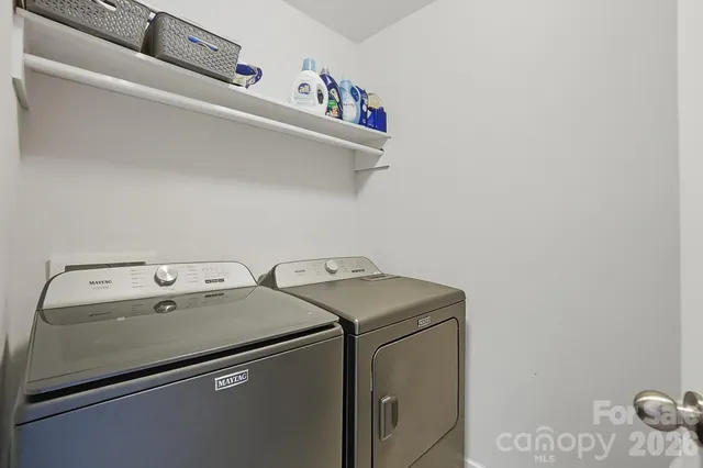 a workspace with furniture and window