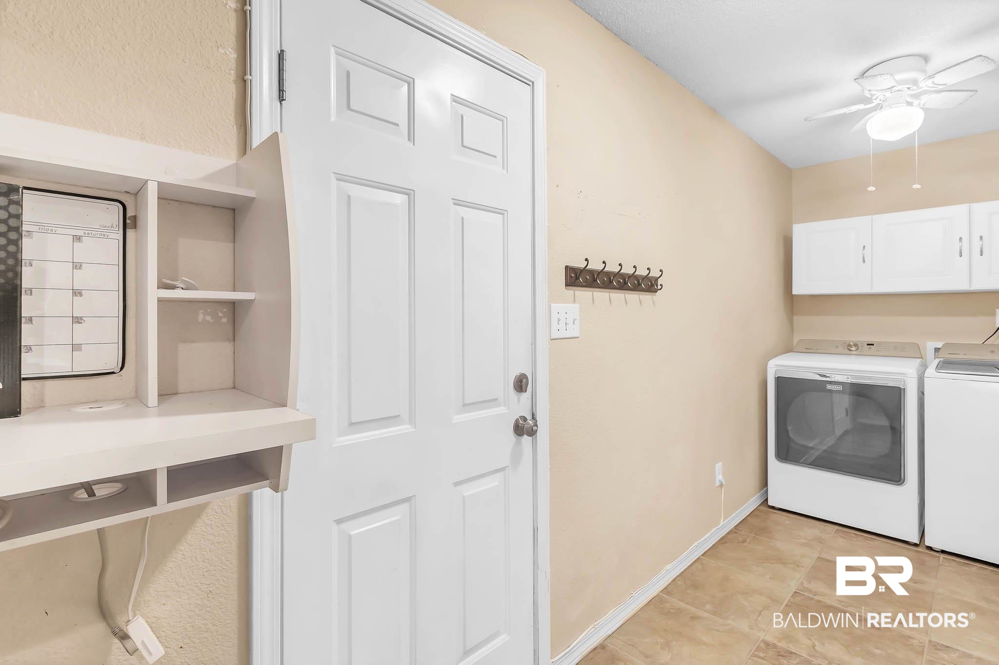9607 Czar Court Fairhope, AL 36532 - Photo 33 of 42 Washroom featuring cabinet space, washer and dryer, and ceiling fan
