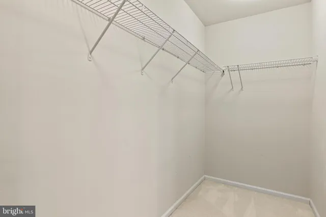 a view of a room with racks on the wall