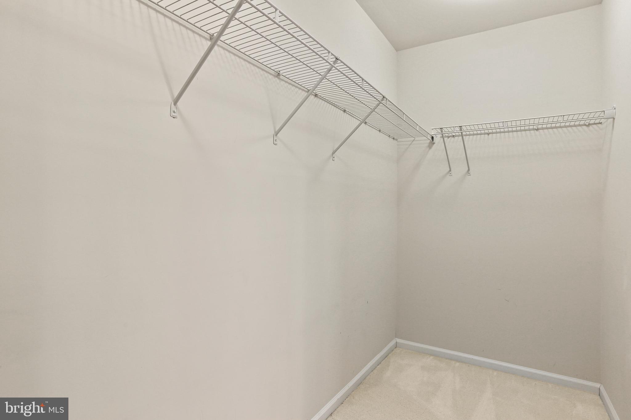 2719 Amber Crest Road Hanover, MD 21076 - Photo 11 of 22 a view of a room with racks on the wall