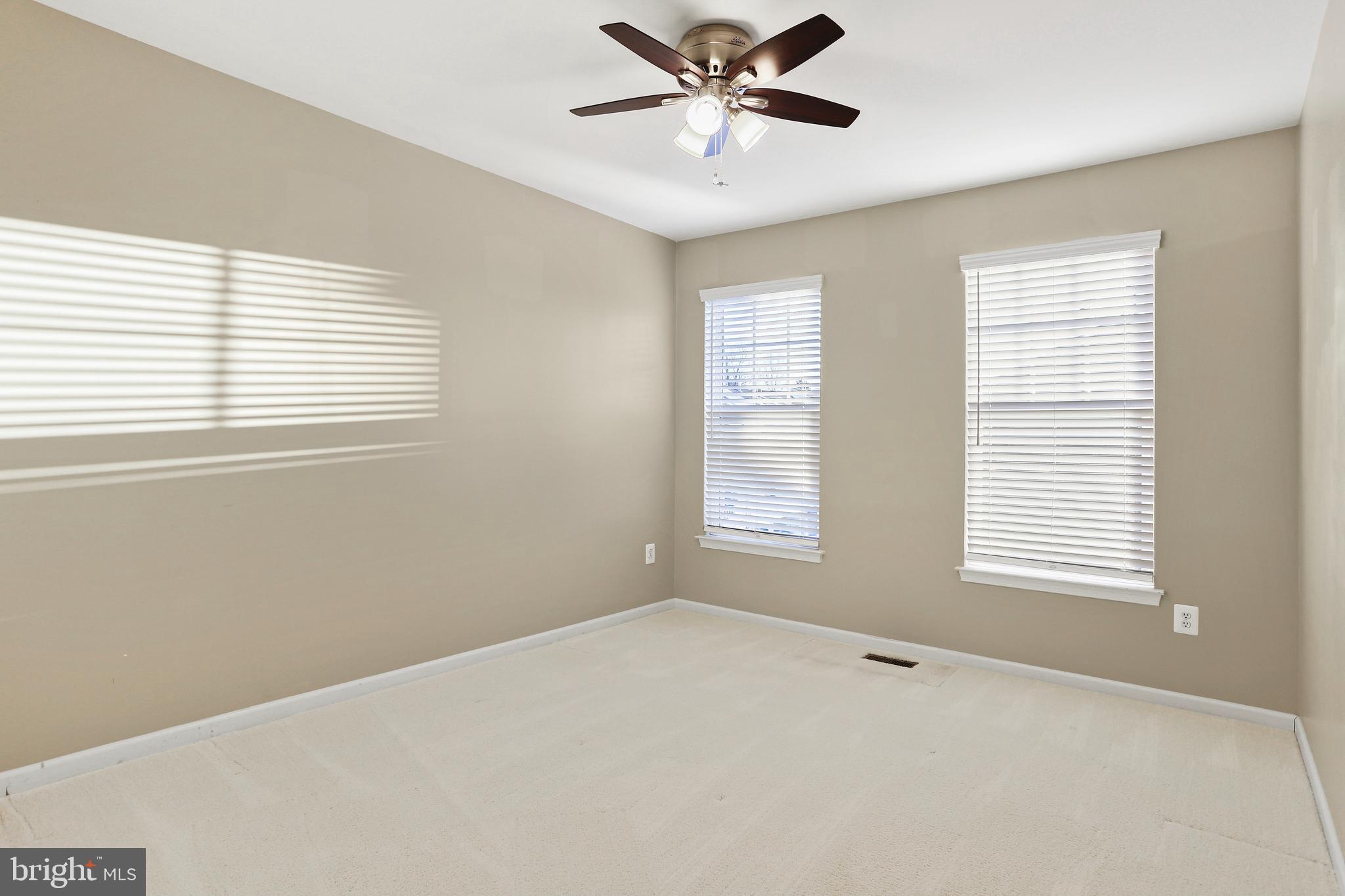 2719 Amber Crest Road Hanover, MD 21076 - Photo 5 of 22 a view of an empty room with a window