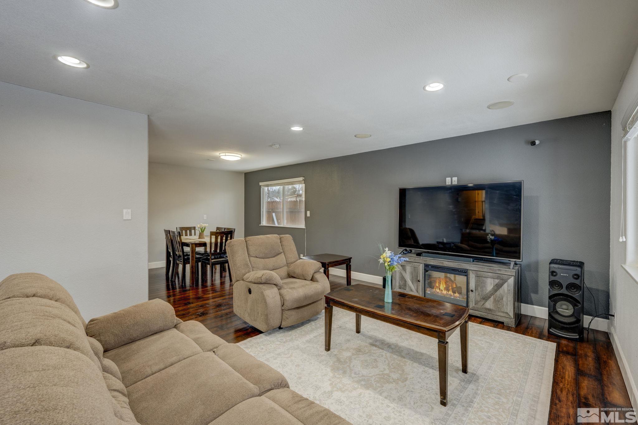 3450 West 7th Street Reno, NV 89503 - Photo 18 of 40 a living room with furniture and a flat screen tv