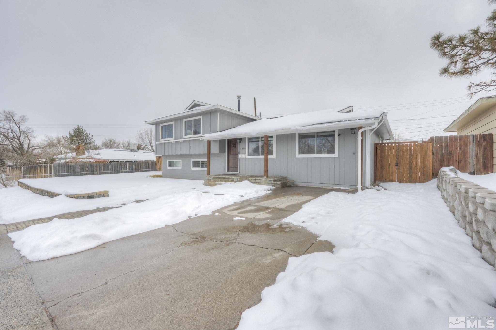 3450 West 7th Street Reno, NV 89503 - Photo 2 of 40 a view of a house with a yard