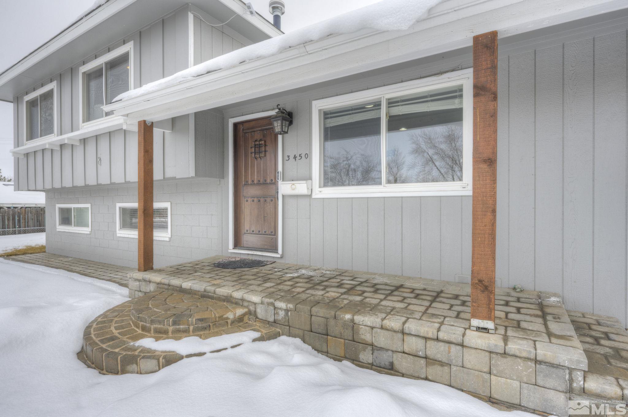 3450 West 7th Street Reno, NV 89503 - Photo 5 of 40 a view of a brick house with many windows