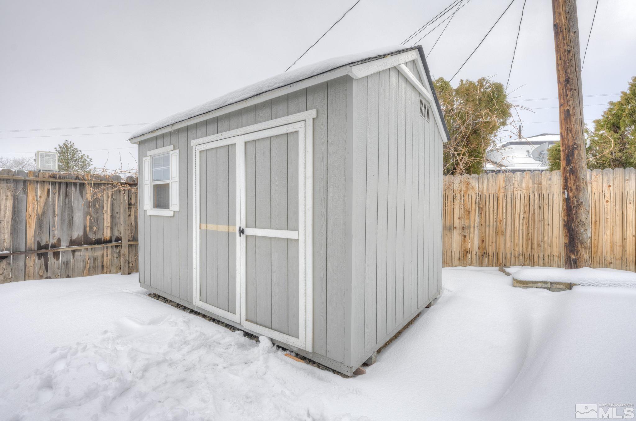 3450 West 7th Street Reno, NV 89503 - Photo 8 of 40 a view of a house with a backyard
