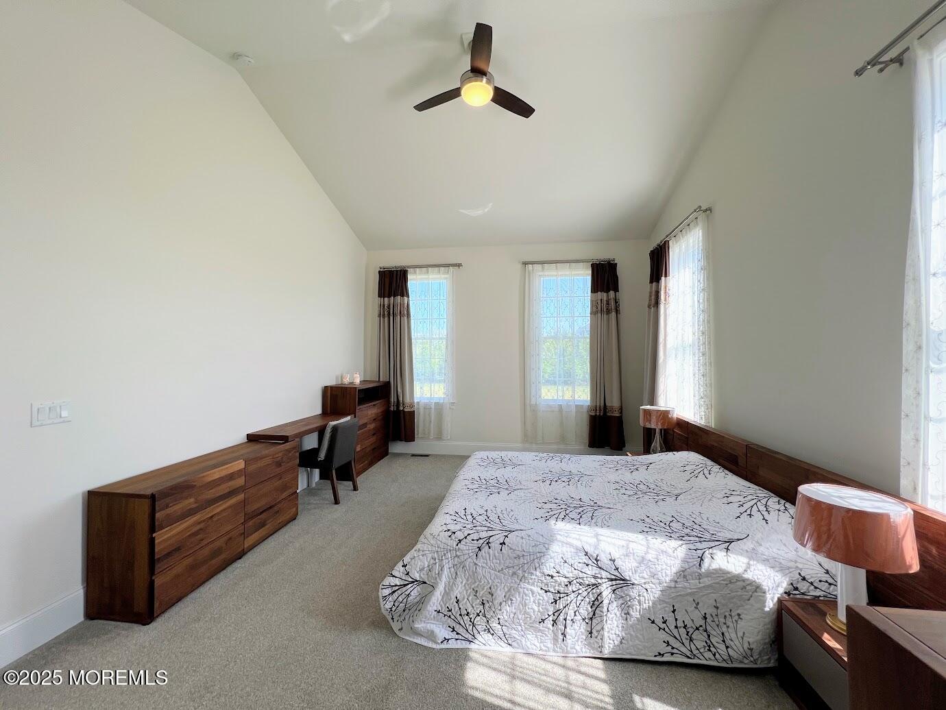 16 Exeter Way Holmdel, NJ 07733 - Photo 20 of 57 a bedroom with bed and window