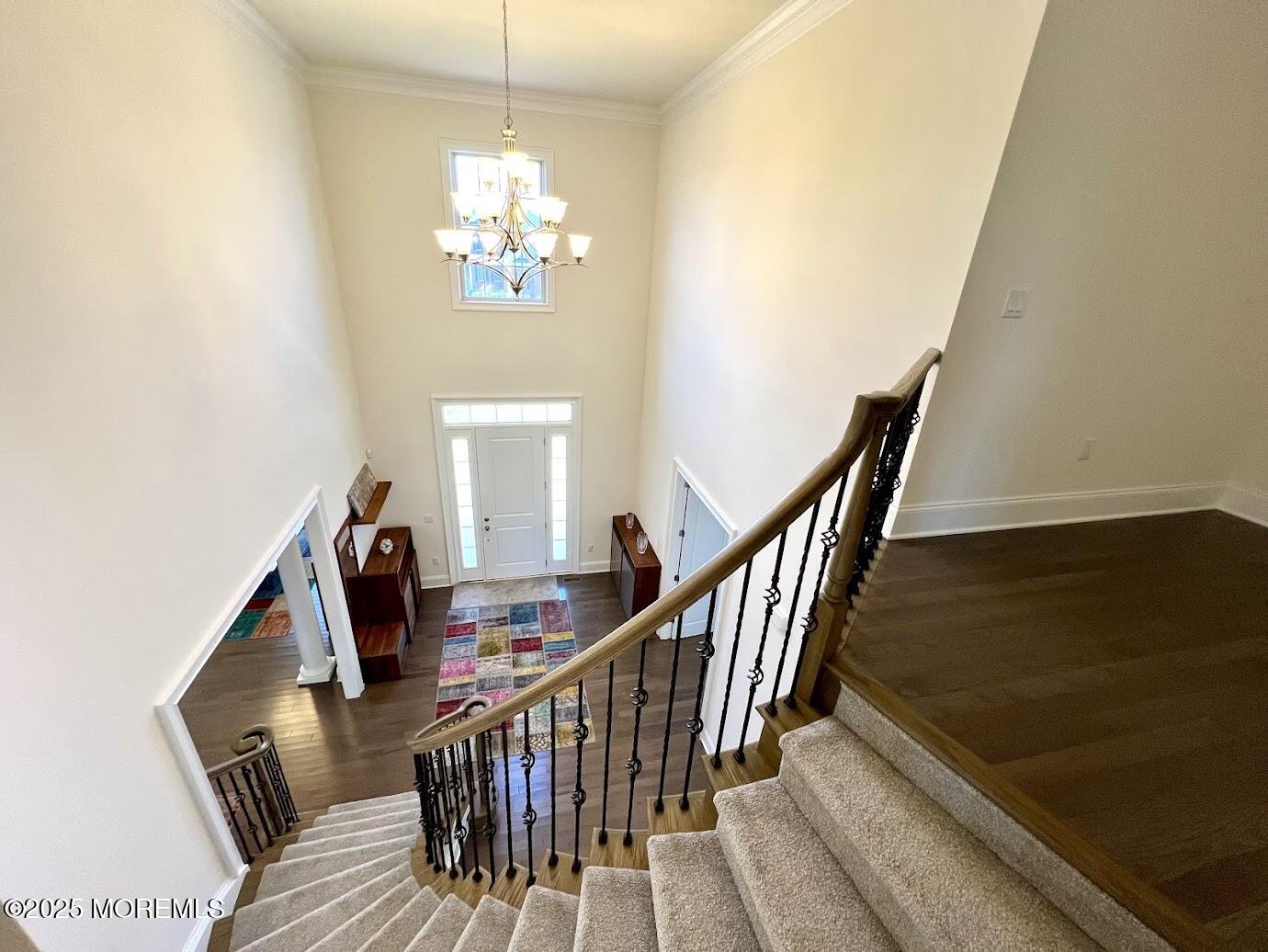 16 Exeter Way Holmdel, NJ 07733 - Photo 25 of 57 a view of entryway and hall with wooden floor