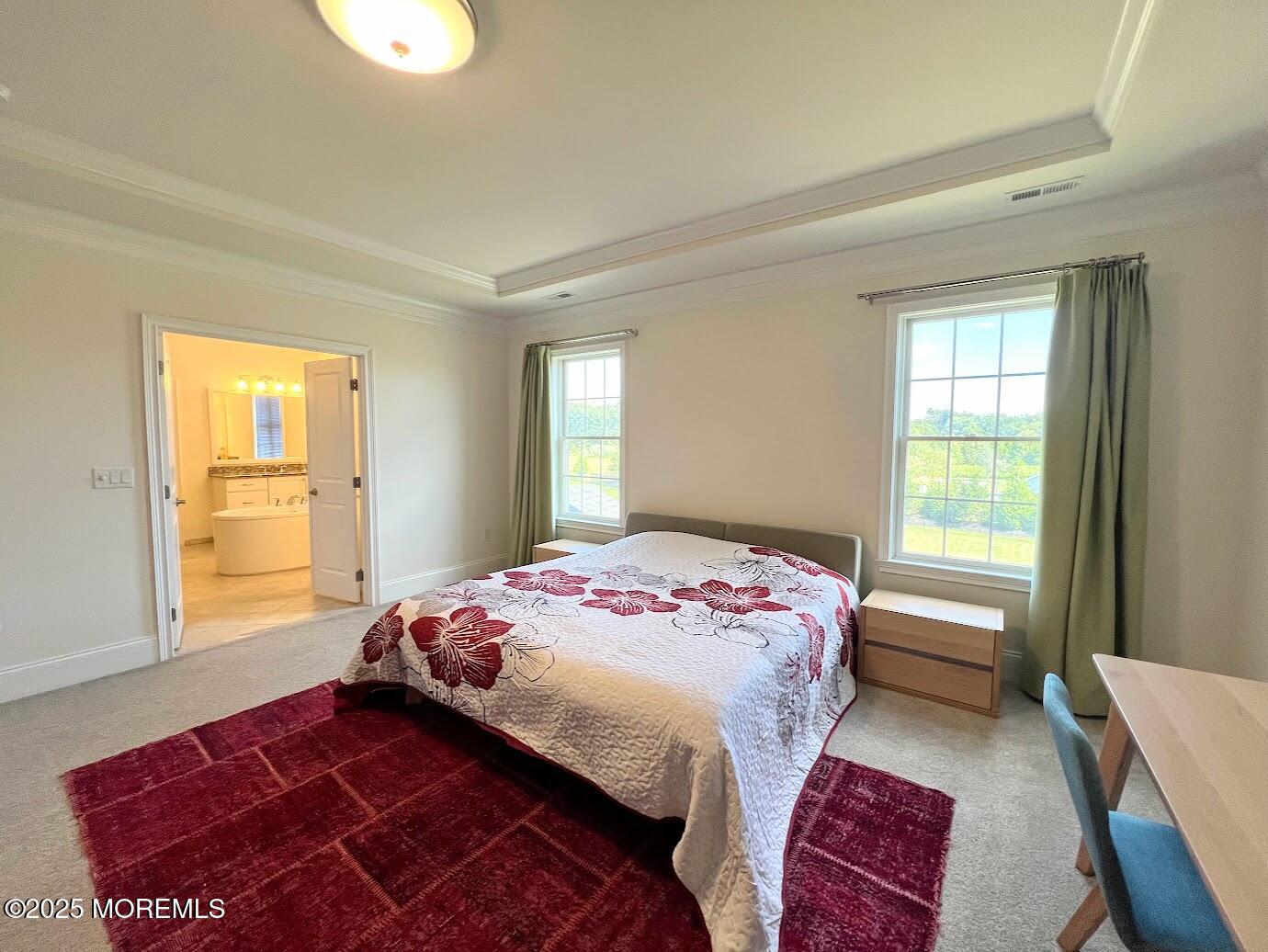 16 Exeter Way Holmdel, NJ 07733 - Photo 30 of 57 a bedroom with a bed and a window