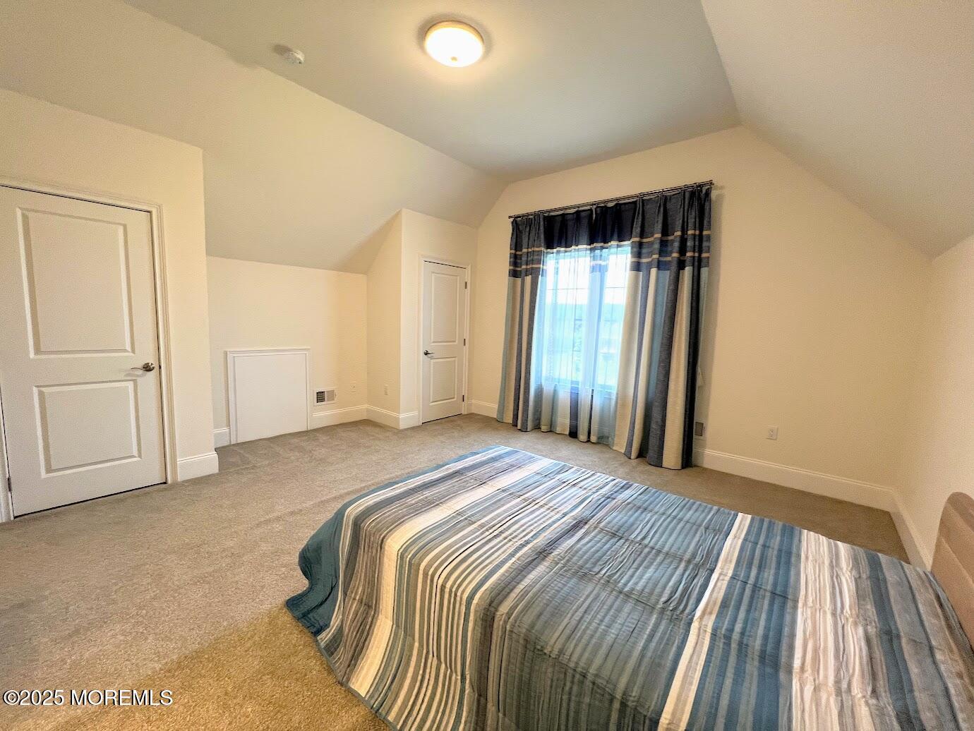 16 Exeter Way Holmdel, NJ 07733 - Photo 41 of 57 a bedroom with a bed and closet