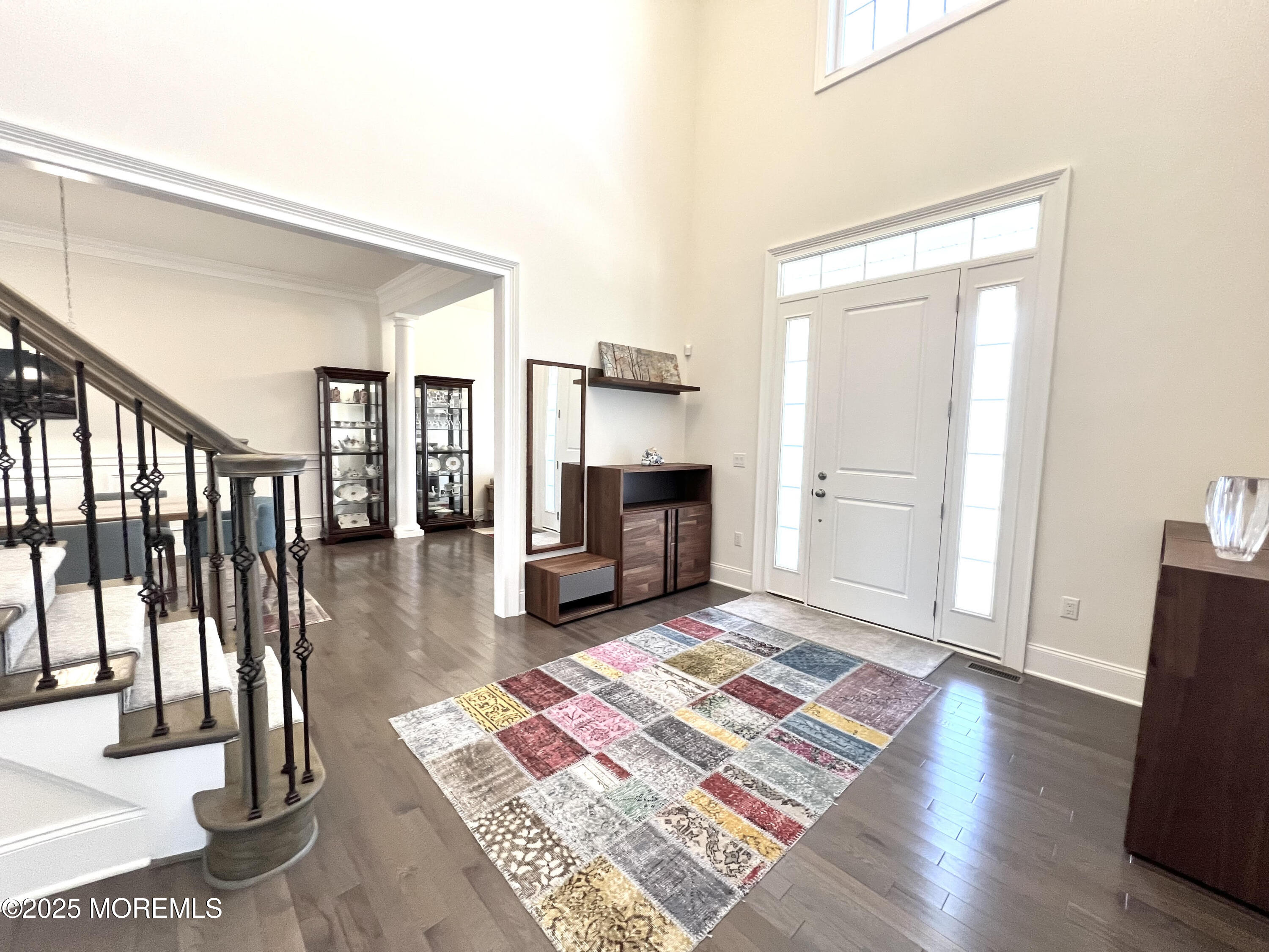 16 Exeter Way Holmdel, NJ 07733 - Photo 5 of 57 a living room with furniture rug and wooden floor