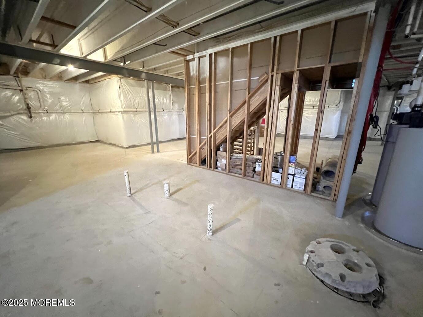 16 Exeter Way Holmdel, NJ 07733 - Photo 51 of 57 a view of an empty room with wooden floor
