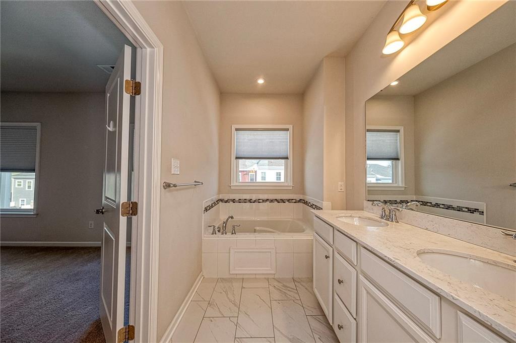 527-529 Tuscarora Road Mars, PA 16046 - Photo 21 of 38 a spacious bathroom with a tub sink and mirror