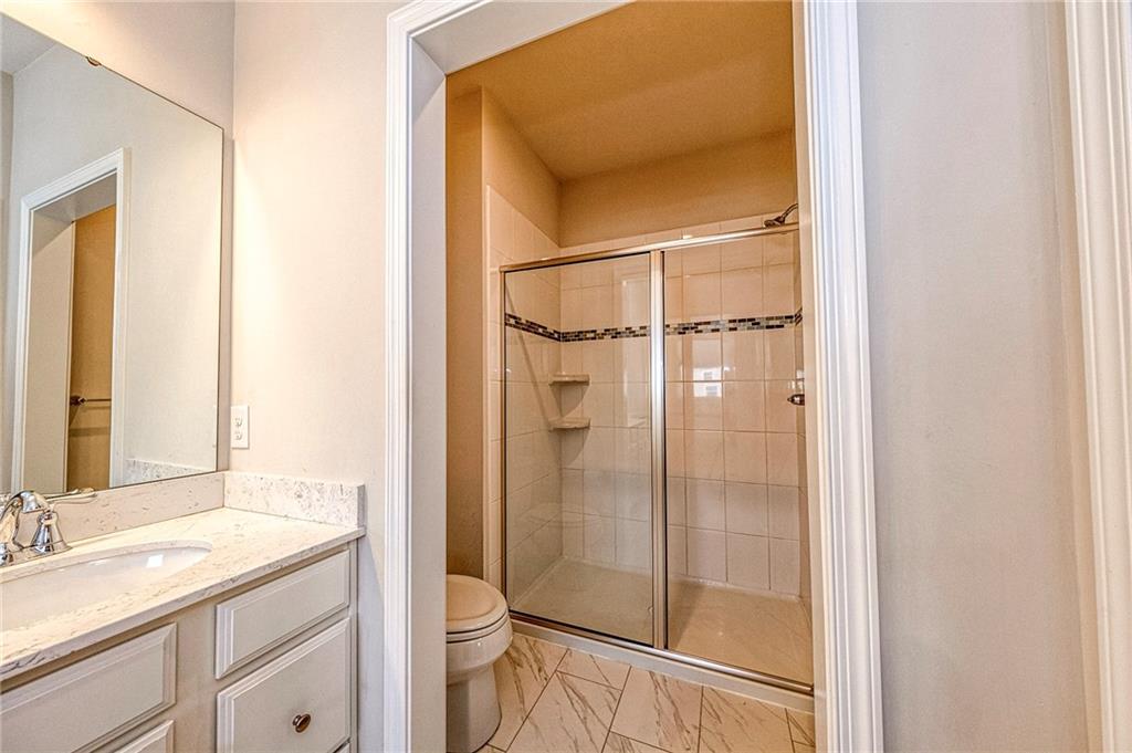 527-529 Tuscarora Road Mars, PA 16046 - Photo 22 of 38 a bathroom with a granite countertop sink mirror and shower