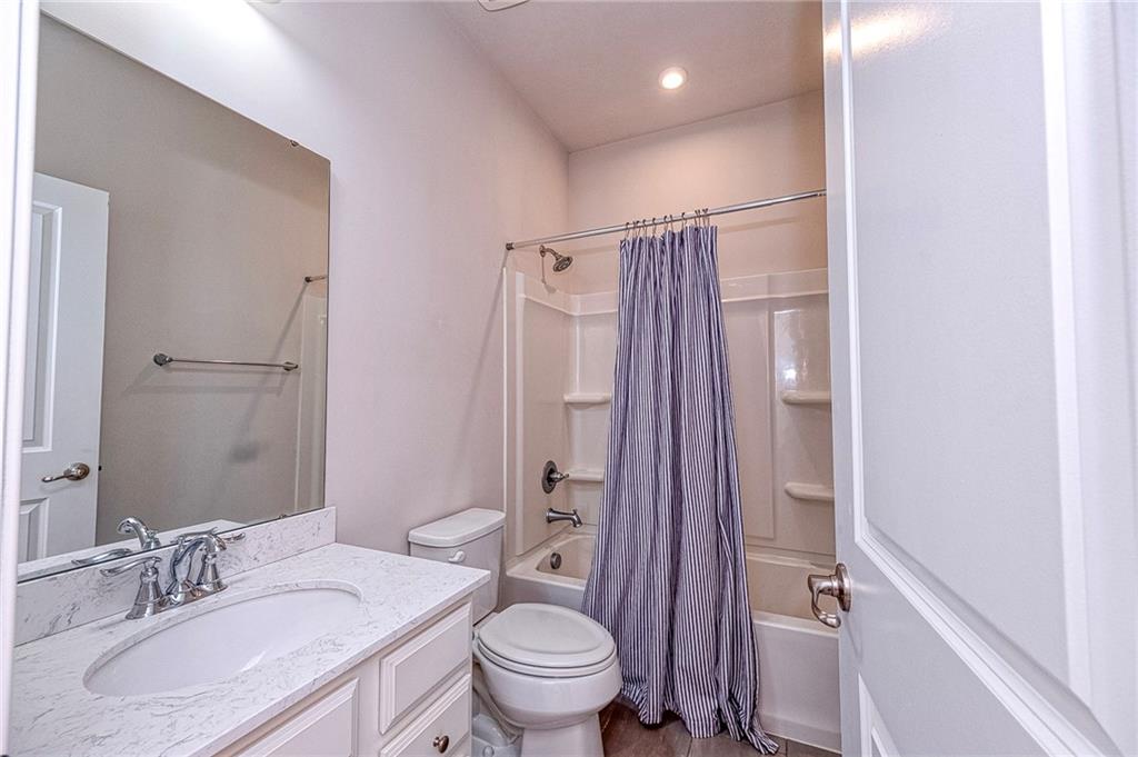 527-529 Tuscarora Road Mars, PA 16046 - Photo 27 of 38 a bathroom with a sink toilet double vanity and shower