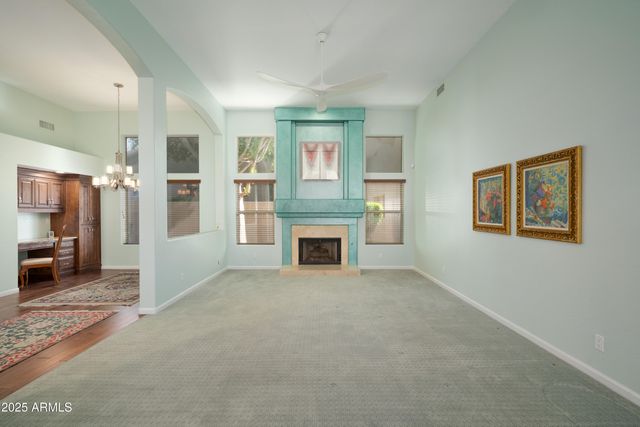 a view of a livingroom with a fireplace