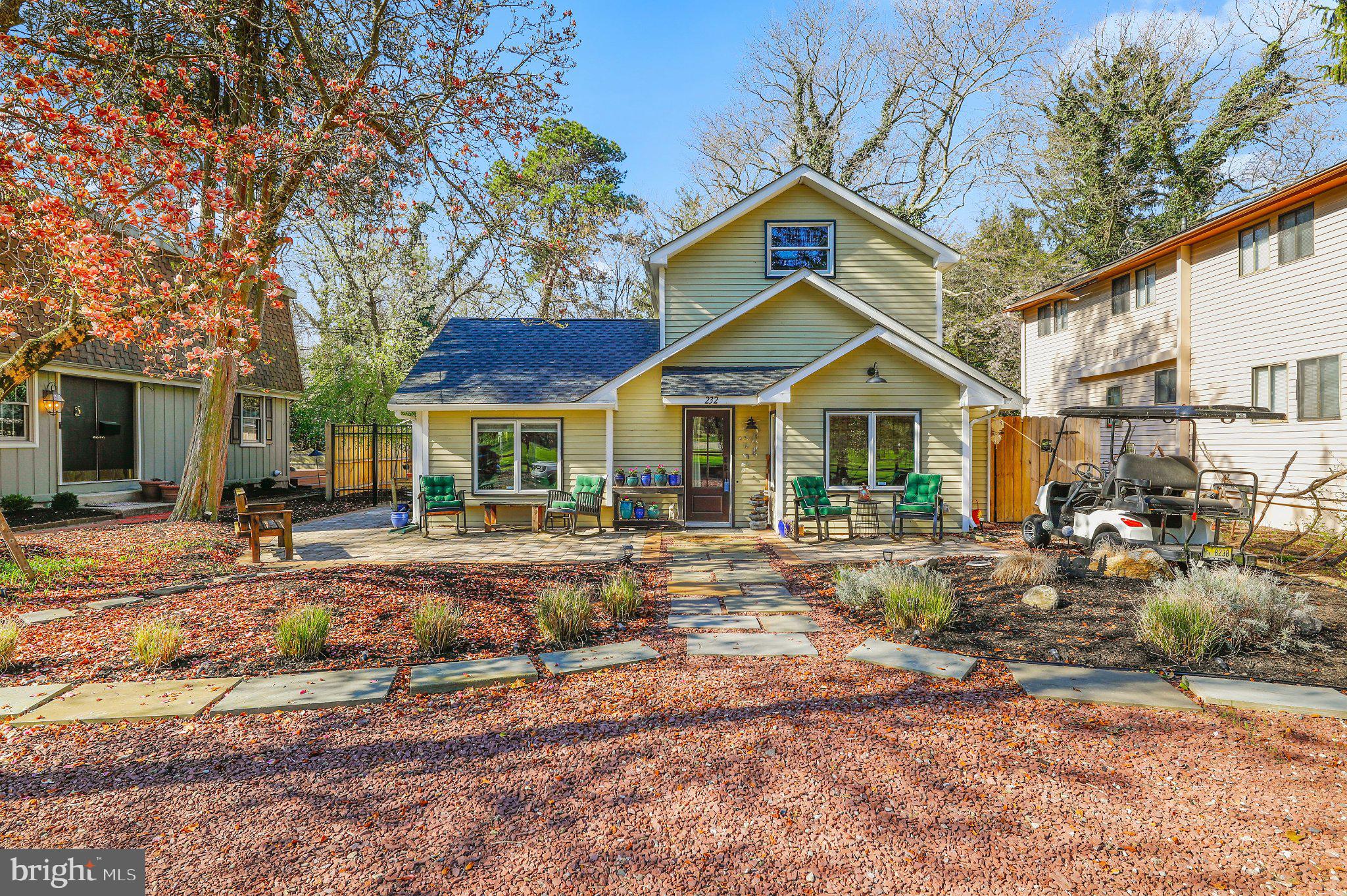 Charming home with inviting garden.