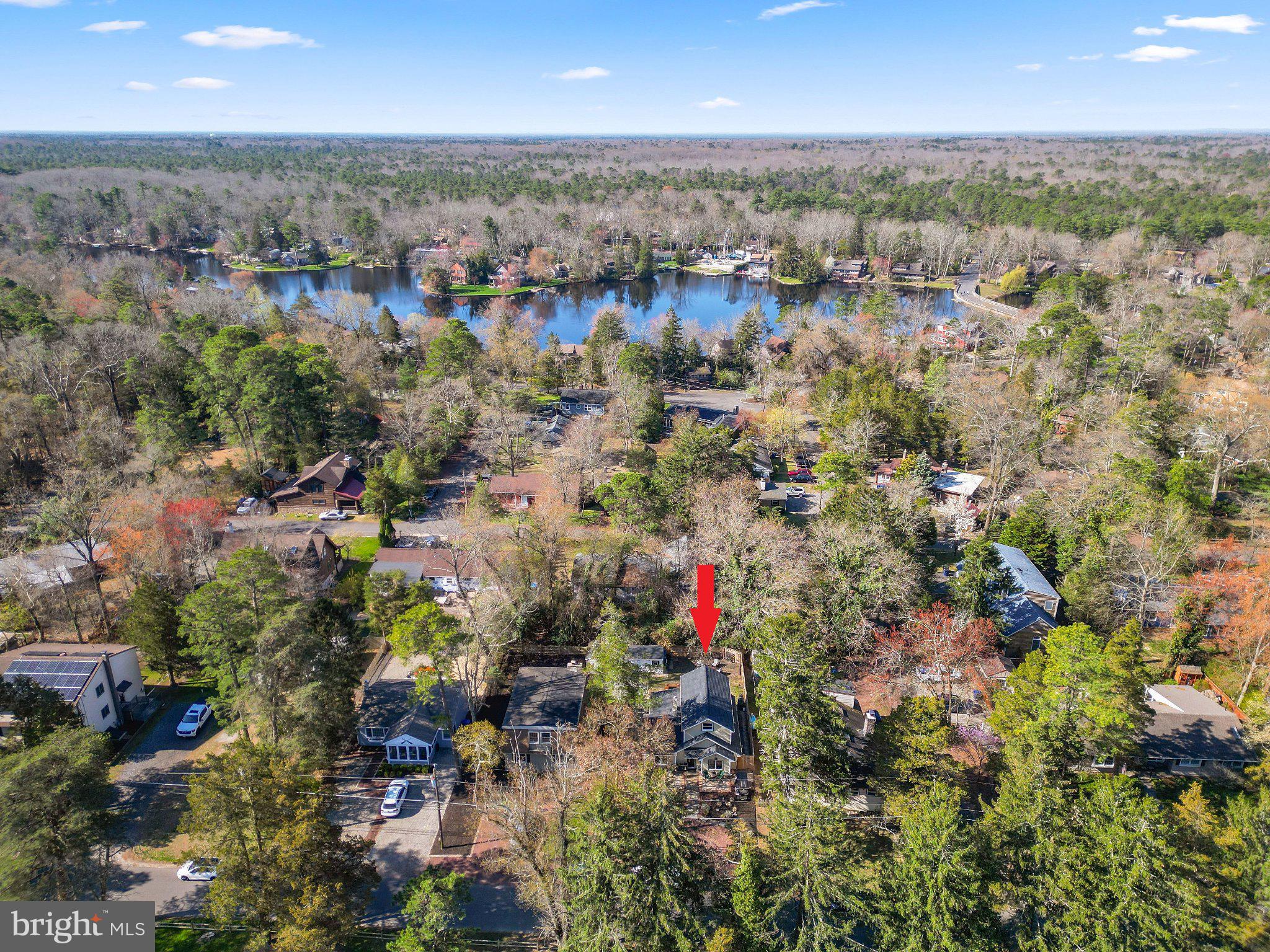 232 McKendimen Road Medford Lakes, NJ 08055 - Photo 11 of 48 Serene lakeside retreat in nature's embrace.