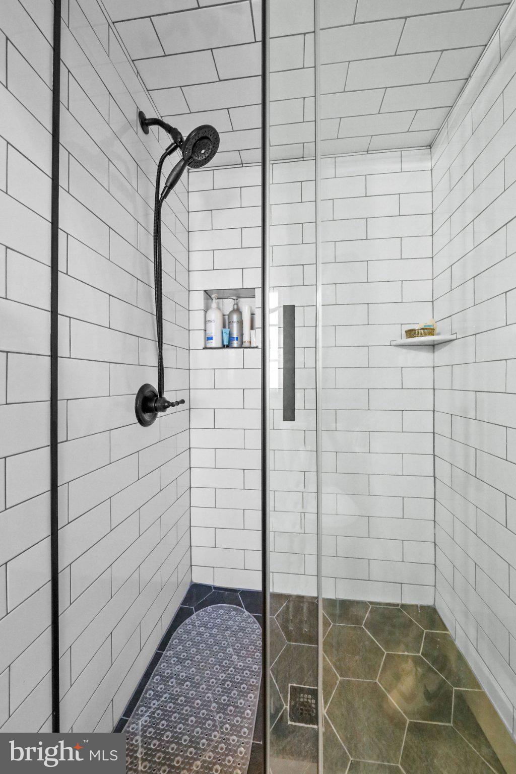 232 McKendimen Road Medford Lakes, NJ 08055 - Photo 31 of 48 Sleek modern shower with elegant tiles.