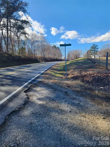 a view of a yard with sitting area