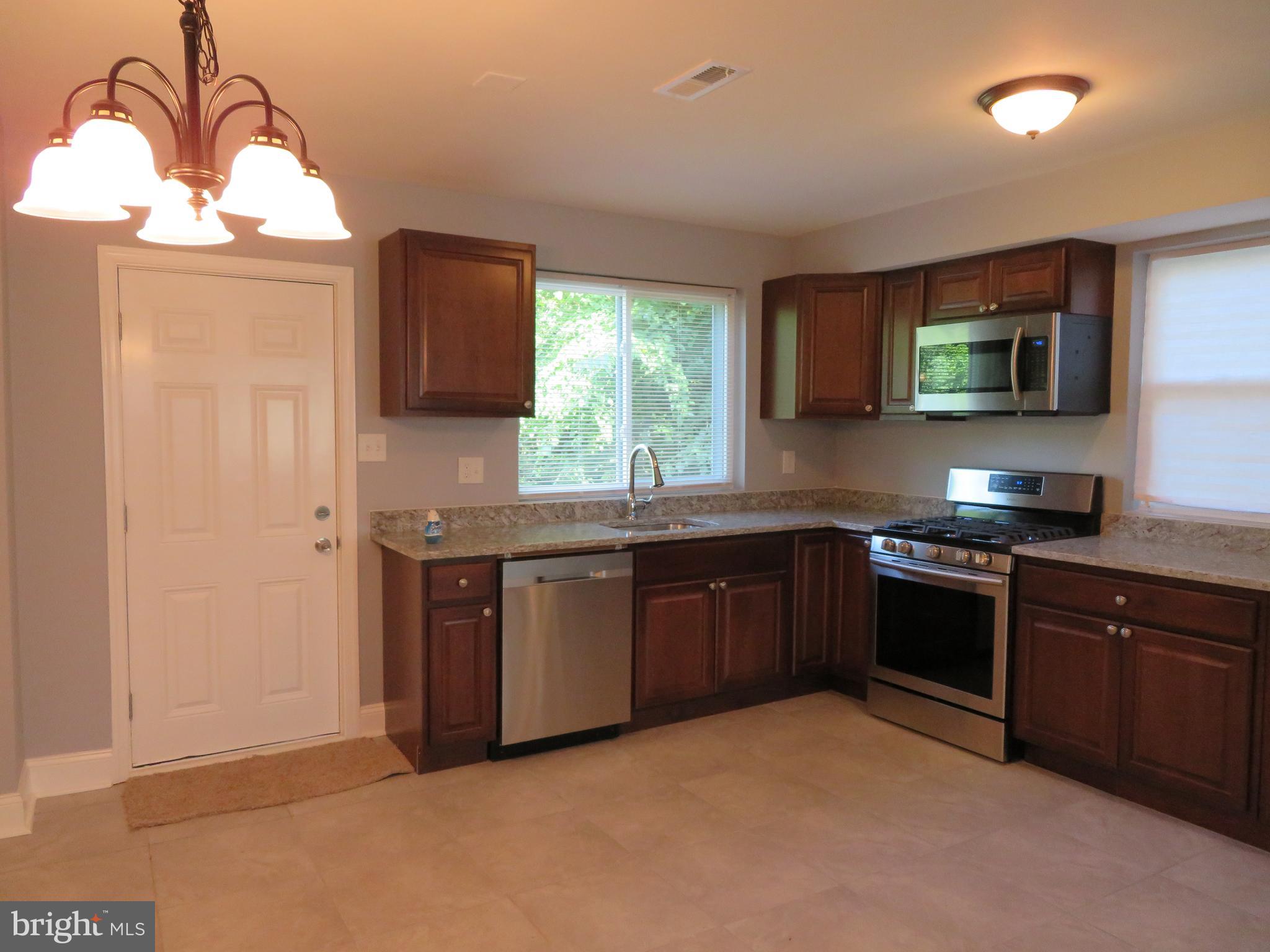 4005 Pimlico Road Baltimore, MD 21215 - Photo 11 of 45 Eat-in Kitchen, Sink and Rear Access
