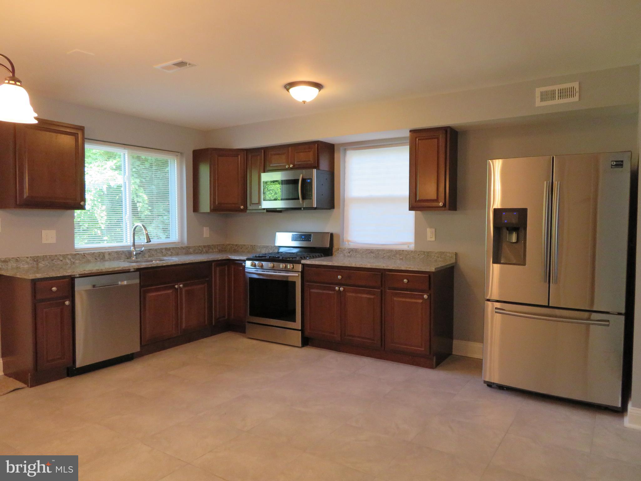 4005 Pimlico Road Baltimore, MD 21215 - Photo 12 of 45 Stainless Steel Appliances with Granite Counters