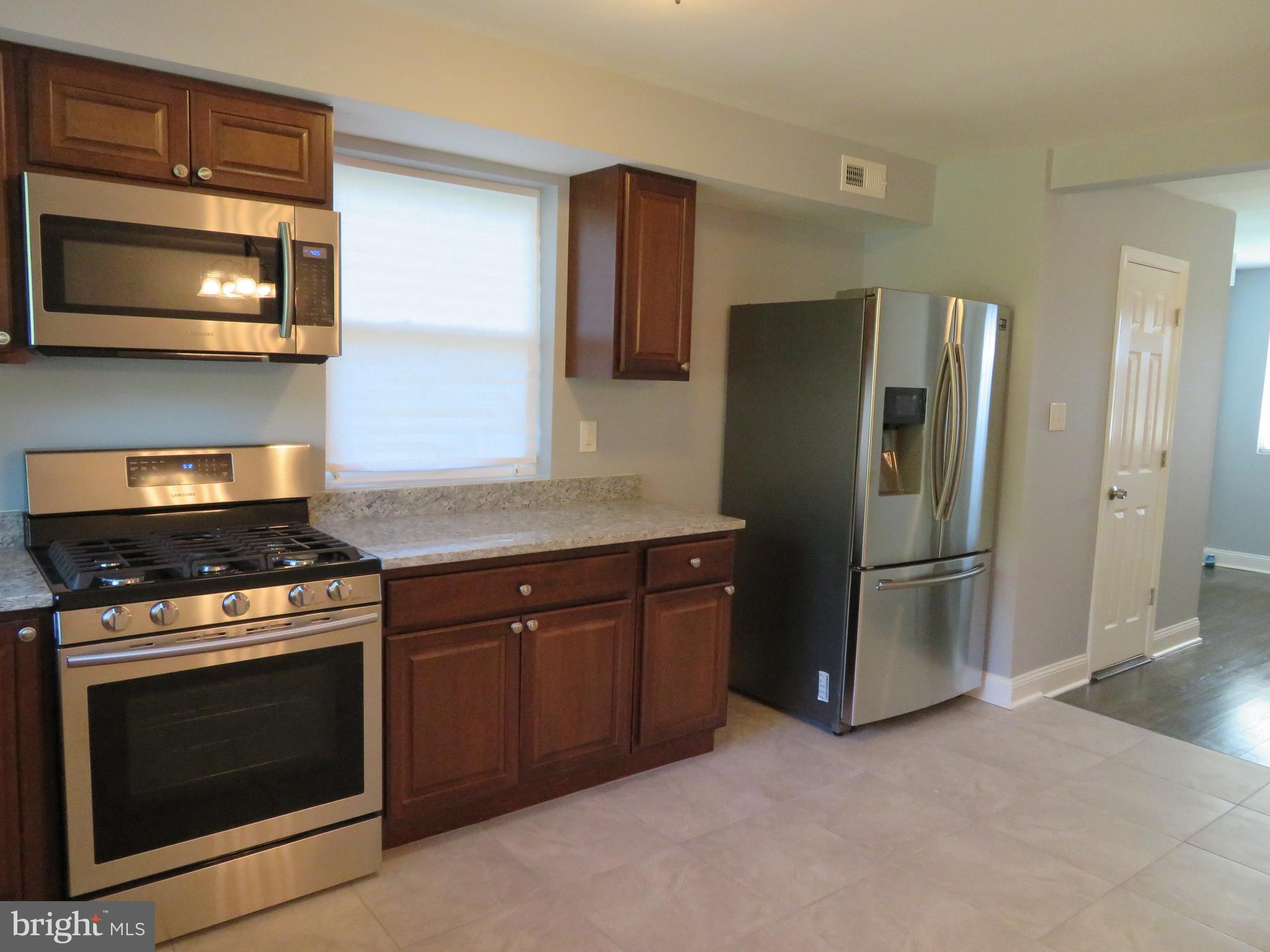 4005 Pimlico Road Baltimore, MD 21215 - Photo 19 of 45 Kitchen - Access to Powder Room and Living Area